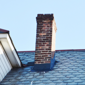 masonry chimney with dark bricks